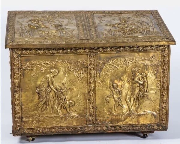 Continental brass repoussé log box. Est. $300–500, sold $450