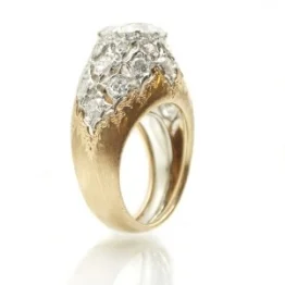 An 18kt rose and white gold diamond ring by Mario Buccellati. Sold for $21,600