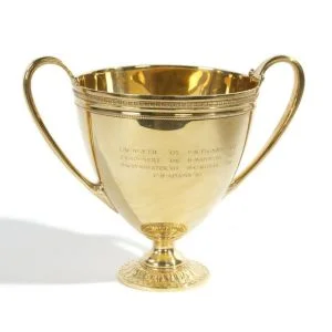 A Tiffany & Co. 18kt yellow gold double-handle presentation cup, 20th century. Sold $17,000