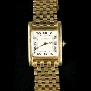 A gold Cartier Tank wristwatch, 1920s. Sold $10,000